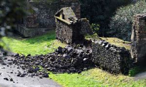 Damaged tomb wall in Pompeii