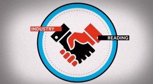 Friends shaking hands. (Image capture from a recent promotional video of the University of Reading.)