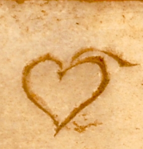 The love heart's precursor: hedera-shaped word division. – Detail from http://nvb.aarome.org/privato/articoli/1059_2.JPG. 